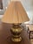 Vintage gold finished brass lamps with carved leaf design