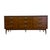 Crafted in warm walnut tones, this authentic mid-century lowboy dresser by Bassett Furniture features a clean-lined...
