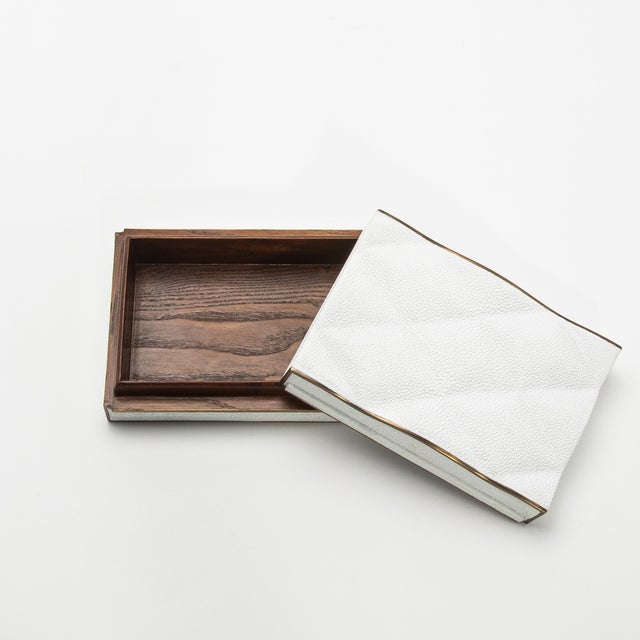 The Coco box collection by Kifu Paris exemplifies luxury through its intricate design and meticulous craftsmanship. This...