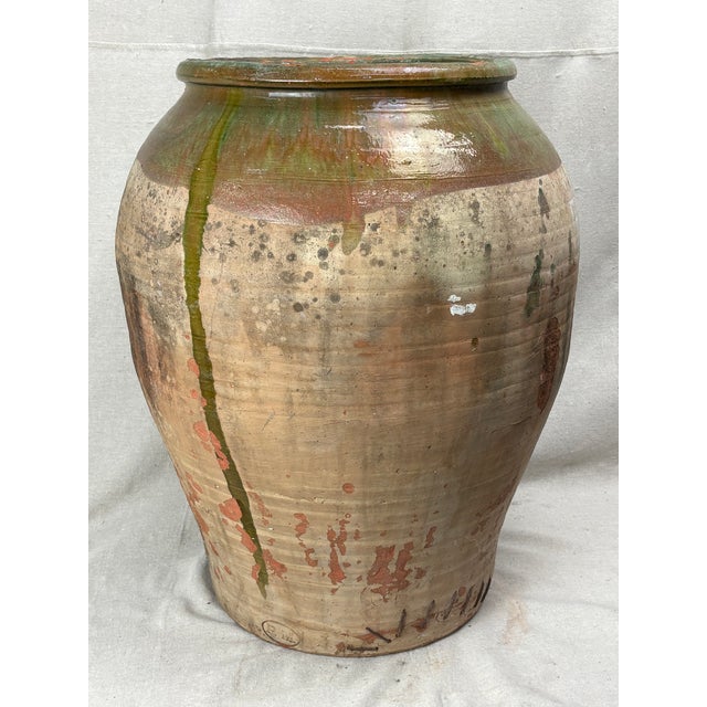 Antique Earthenware Storage Jar With Green Glaze and Staple Repair For Sale - Image 4 of 9