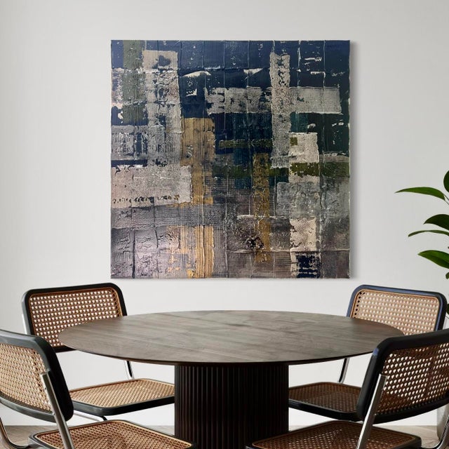 Undertow by J. Kent Martin presents a moody, atmospheric composition dominated by deep blacks, charcoal, and muted...