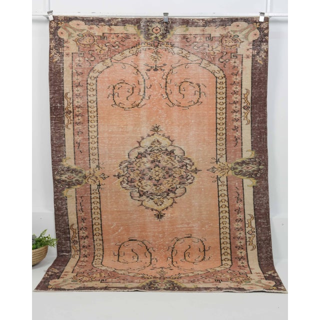 Vintage Hand-Knotted area rug is a semi-antique vintage area rug. The '70s Eastern region of Anatolian's unique rug is...