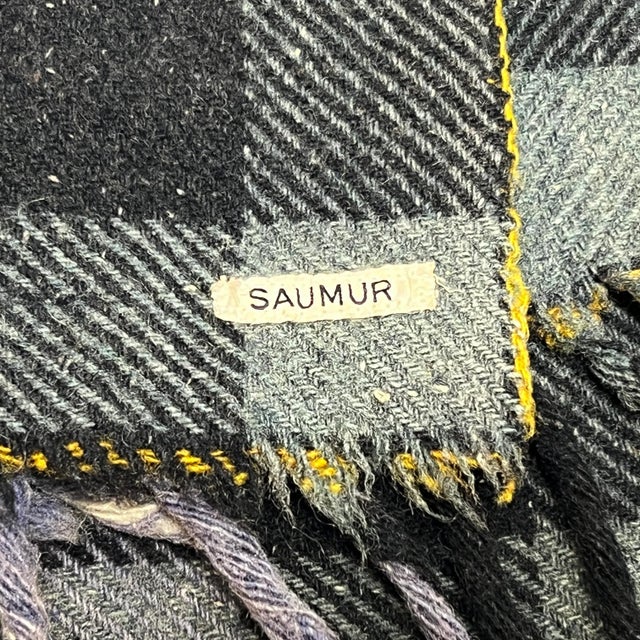 Snuggle up in this classic, preppy, vintage mid century wool plaid blanket, made in France. This beautiful piece features...