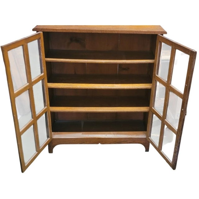 Circa 1900-1910 antique mission oak book in the manner of Stickley. Features all oak construction, three interior shelves,...