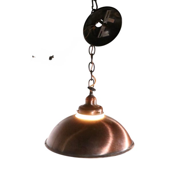 Mid Century Americana style copper finish metal chandelier, with original glass globe shade. Made by the Progressive Mfg....