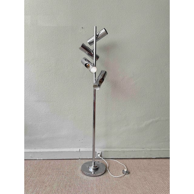 A striking example of Italian modernist lighting design, this Reggiani floor lamp from the 1970s is a sculptural and...