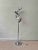 A striking example of Italian modernist lighting design, this Reggiani floor lamp from the 1970s is a sculptural and...