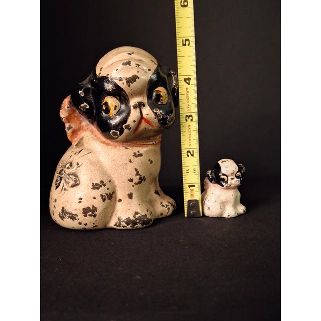 Historical Provenance & Design Significance Created in the 1920s by the Hubley Manufacturing Company, this rare pairing...