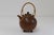 Scandinavian Mid-Century Modern teapot in glazed stoneware with braided bamboo handle. Designed by Gunnar Nylund, made by...