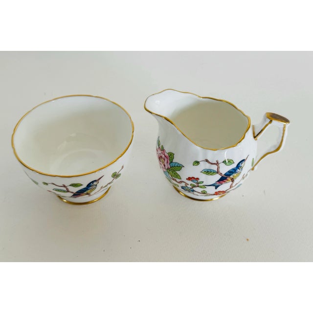 Vintage 1960s Aynsley England Small Sugar & Creamer Set. A beautiful set depicting a bird on a branch with flowers. Both...