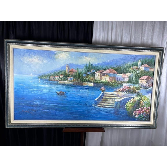 Bring the warmth of the European coast into your space with this striking, large-scale original oil painting on canvas....