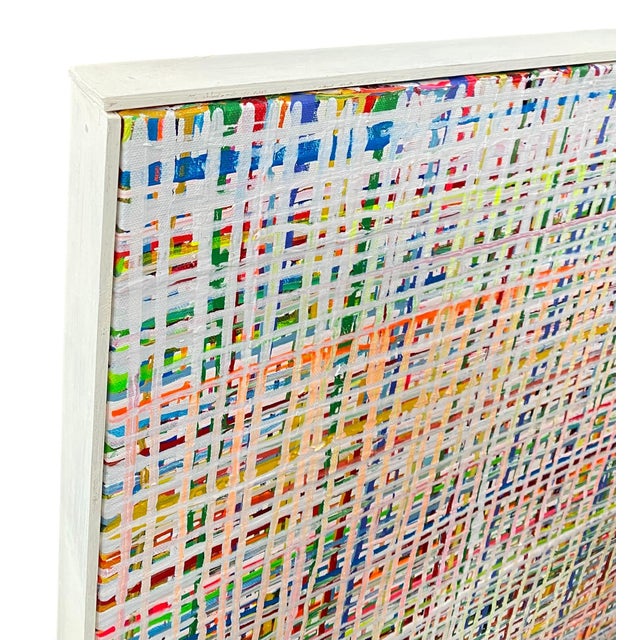 A colorful modern abstract painting on canvas with a minimal wood frame. Signed on front and back.