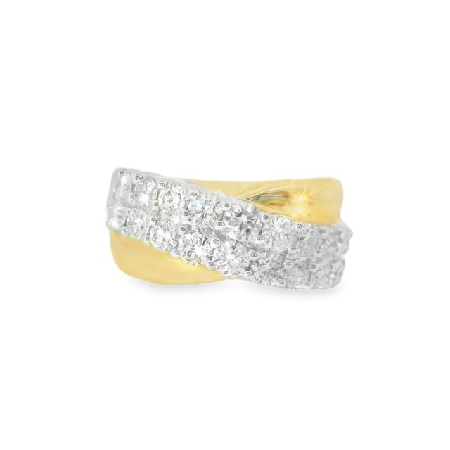 14K white and 2 tone gold designer ring featuring numerous brilliant round diamonds totaling 1.5 carats. Size 7, weighs...