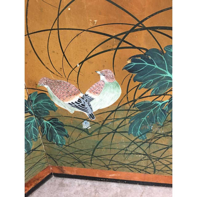 Beautiful vintage painted screen, with floral and bird design. This screen can be displayed in the folded configuration,...
