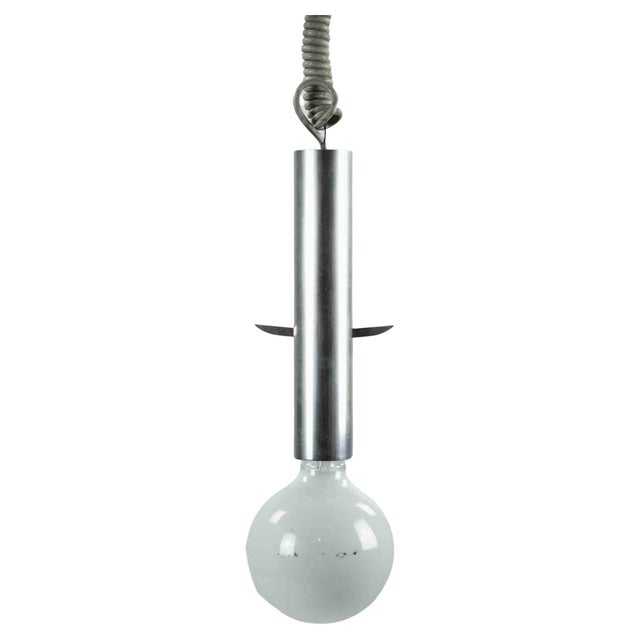 Pendant light is an original design lamp realized in the 1970s by Gaetano Sciolari. A minimal and elegant lamp with a...