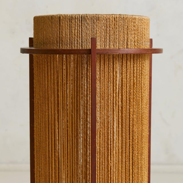 Hewn from organic materials, this Danish floor lamp was designed by Ib Fabiansen for Fog & Mørup in the 1960s. The...