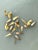 This captivating vintage brass wall sculpture, crafted in the manner of Curtis Jere, exemplifies the playful...
