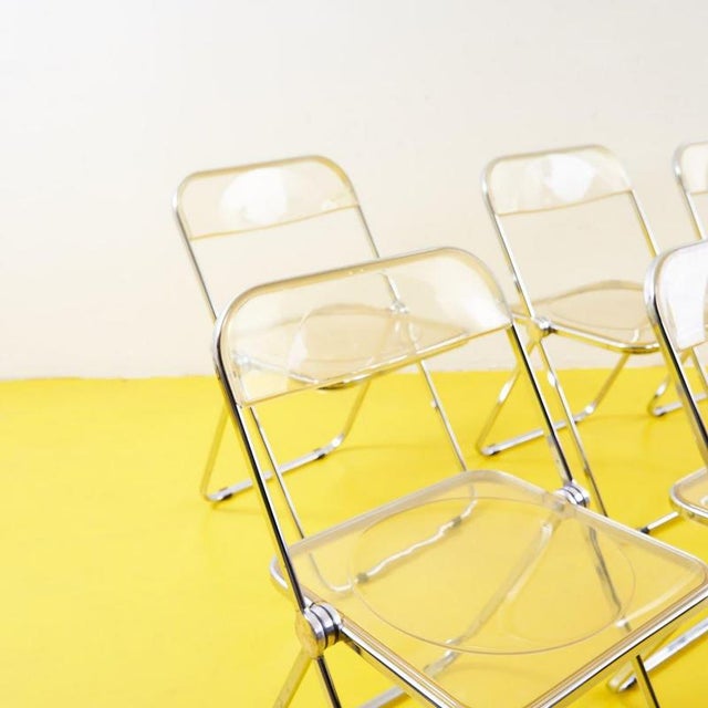 Item : discover the timeless elegance of the set of 6 plia chairs by anonime castelli, a perfect blend of minimalist...