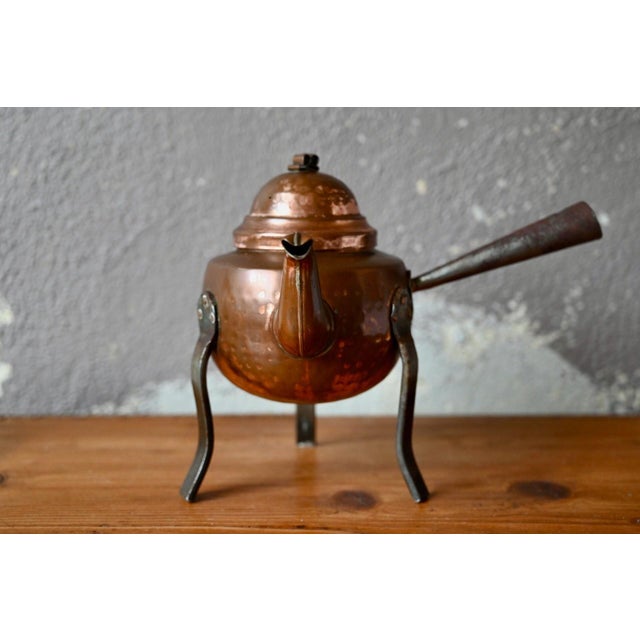 Sourced in Sweden, this beautiful antique hand-hammered copper teapot possesses all the character of objects that have...