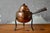 Sourced in Sweden, this beautiful antique hand-hammered copper teapot possesses all the character of objects that have...
