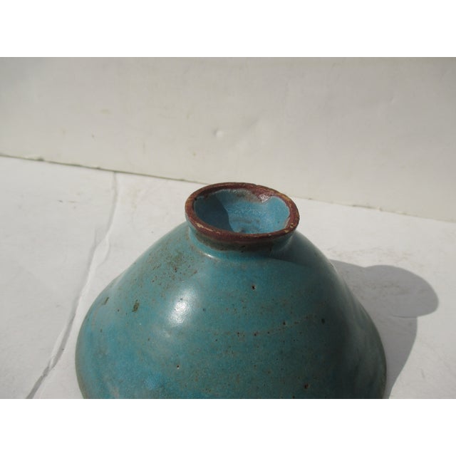 Modern Studio Art pottery. Classic tea bowl shape with an incised ray pattern over the thin inner walls. Glazed in a satin...