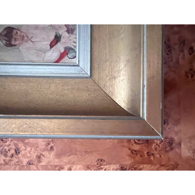 This is a small painted portrait, set within a substantial shadow-box style frame with a deep, wide gilt liner — a...