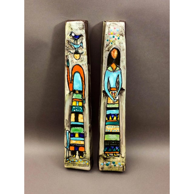 Harris G Strong Signed Mid Century Pair Of Figural Ceramic Wall Hanging Art Tile. Measures approximately 5" long, 1 3/4"...