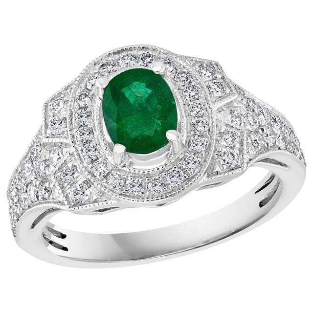 0.80 Carat Oval Cut Emerald and 0.85 Carat Diamond Ring 18 Karat White Gold For Sale - Image 15 of 18