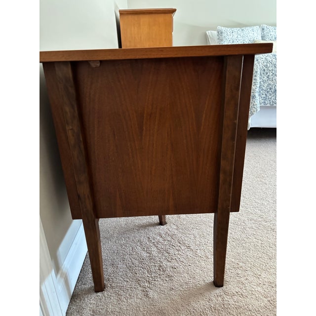 This piece is a one-family owned heirloom. The executive writing desk was manufactured by Stanley Furniture under its...