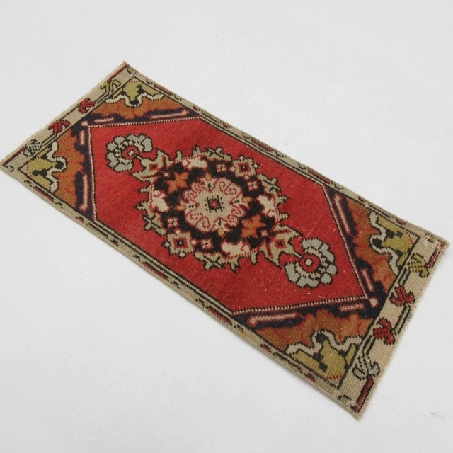 Vintage handknotted decorative mini rug from Konya region of Turkey. Approximately 50-60 years old. In very good condition.