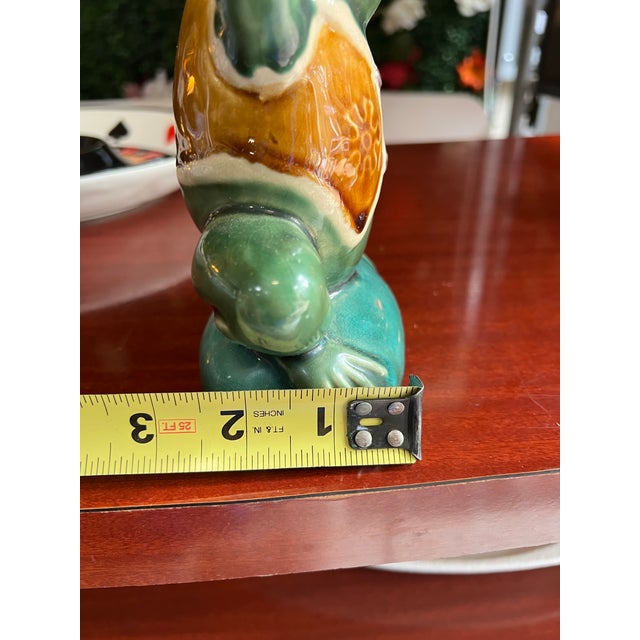 Up for consideration is a beautiful vintage colorful ceramic frog candlestick holder. This would look lovely in your home...