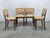 Set of four dining chairs produced by Thonet in Czechoslovakia during the 1940s. These chairs are crafted from solid beech...