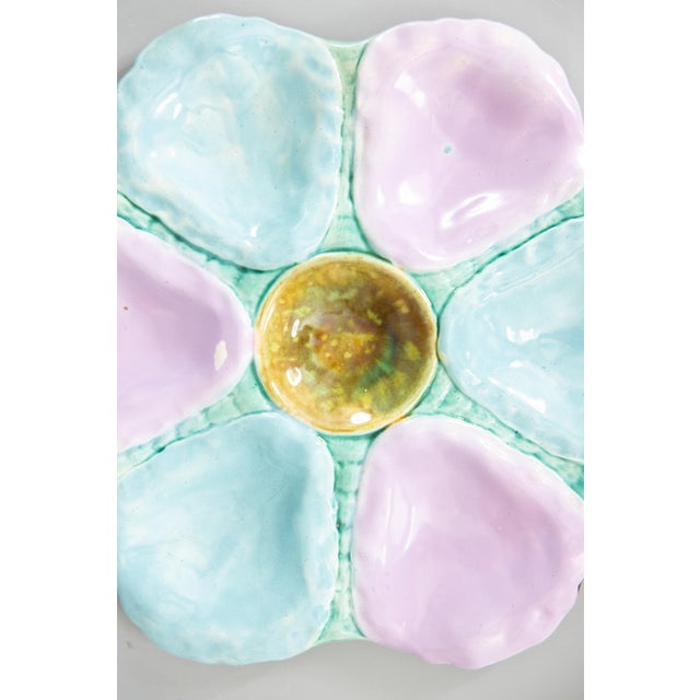 A gorgeous antique 19th-Century English majolica oyster plate, circa 1870-1890. This fine quality oyster plate has six...