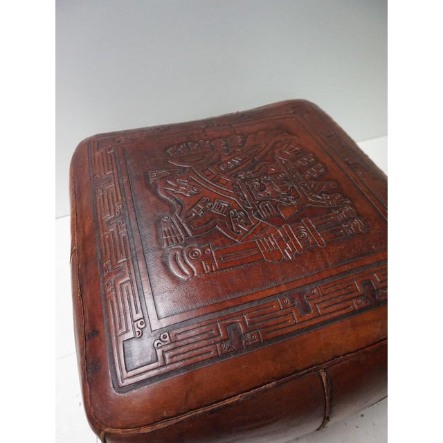 Beautiful and intricate saddle leather hand-tooled embossed with Maya-inspired decorations by Angel Pazmino for Meubles de...