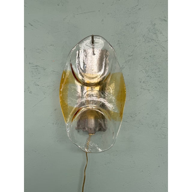 Vintage wall light made in Italy in the 1960s Steel frame and drop-shaped Murano glass shade, handmade by master...