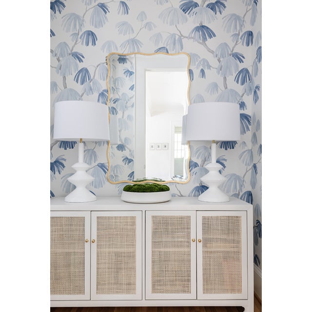 New special order item. Not vintage. British West Indies style with a modern flair, this chic cabinet showcases natural,...