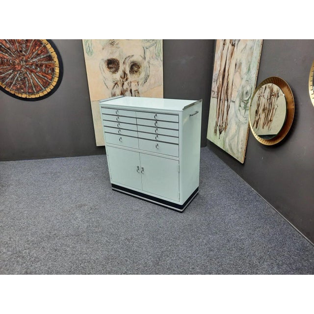 Wonderful and rare instrument cabinet by Baisch from the 1950s and early 1960s. Very rare in the pastel green or mint...