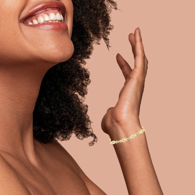 Early 21st Century 14K Yellow Gold Plated .925 Sterling Silver Channel Set Diamond Accent Twist 4”-10” Adjustable Bolo Bracelet (I-J Color, I3 Clarity) For Sale - Image 5 of 6