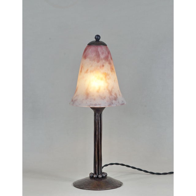 Marcel Vasseur & Daum A wonderful French art deco lamp made around 1925 in wrought iron of excellent quality. The forged...