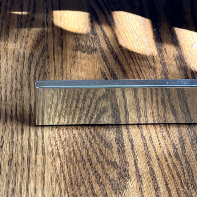 Restoration Hardware Royce Chaise A distinctive H-shaped frame supports the graceful waves of this 1970s-inspired chaise....