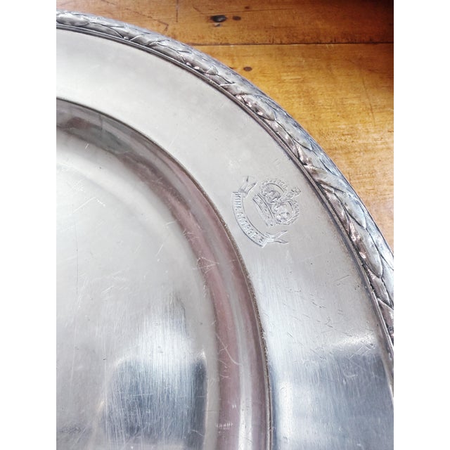 An antique circa late 1800s heavy silver plated serving tray or charger made by Christofle for the hotel or restaurant...
