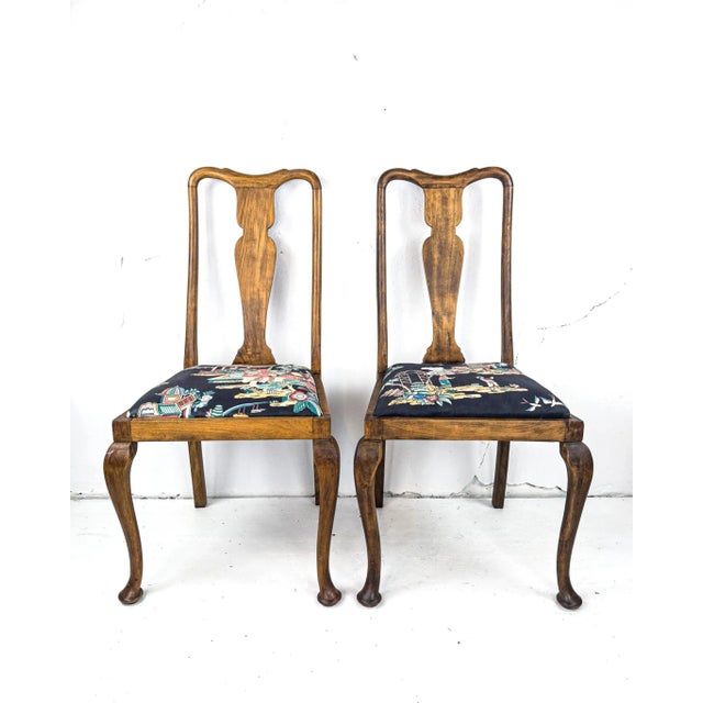 A stunning set of four Queen Anne-style dining chairs from the 1930s that are in sturdy condition. We adore these ladies...