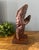 Exceptional vintage hand-carved burl wood sculpture depicting an elegant abstract female profile emerging naturally from...
