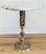 Classic vintage French style brass filigree base table with round marble top. Marble features gorgeous veining. Versatile...