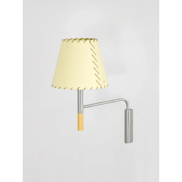 Beige bc3 wall lamp by santa & cole dimensions: d 20 x w 37 x h 41 cm materials: metal, beech wood, stitched parchment....