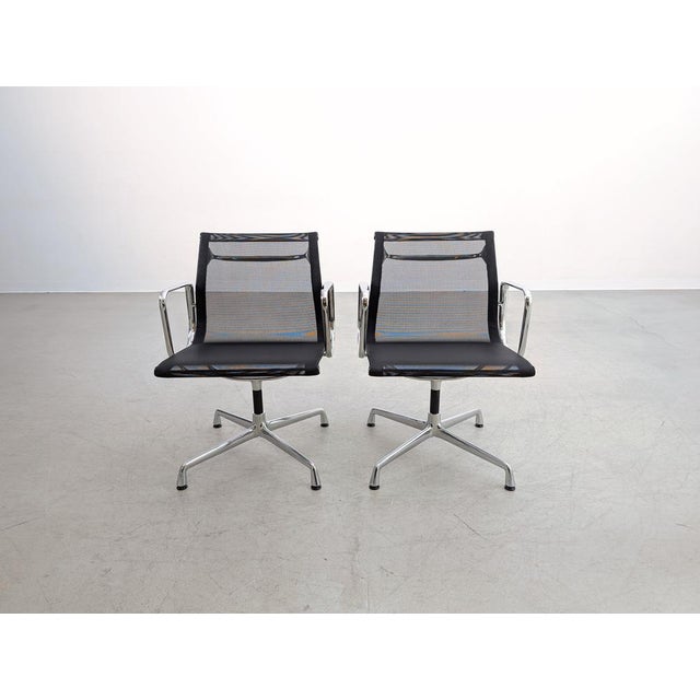 We are offering one of three beautiful sets of two Vitra EA108 office/conference chairs with mesh upholstery for sale....