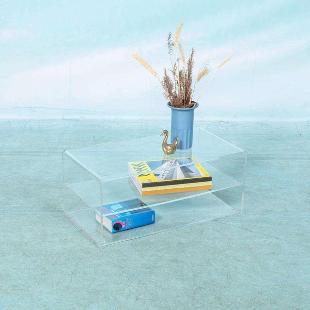 Made entirely of acrylic glass: this transparent sideboard can be used as audio or TV furniture, but can also be used as a...