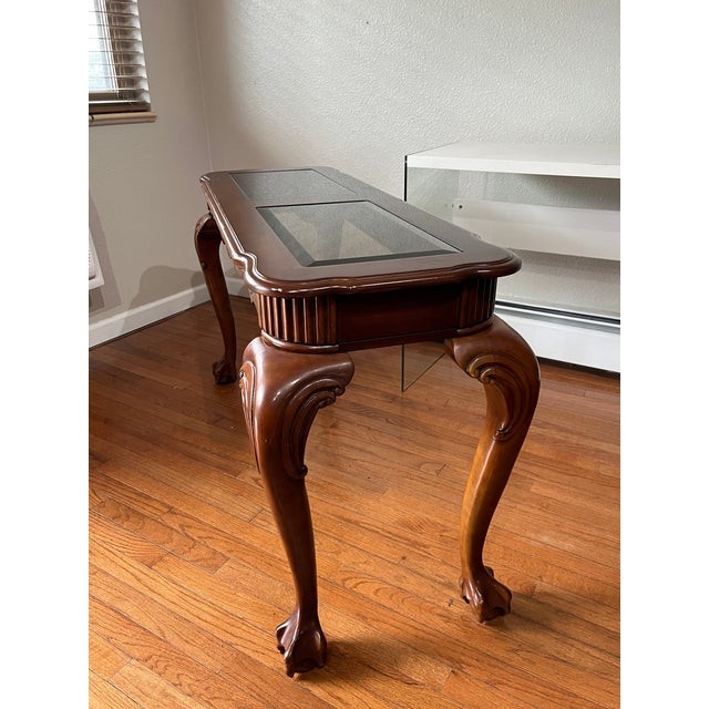 Elevate your entryway, hallway, or living space with this striking vintage Chippendale-style console table. Masterfully...
