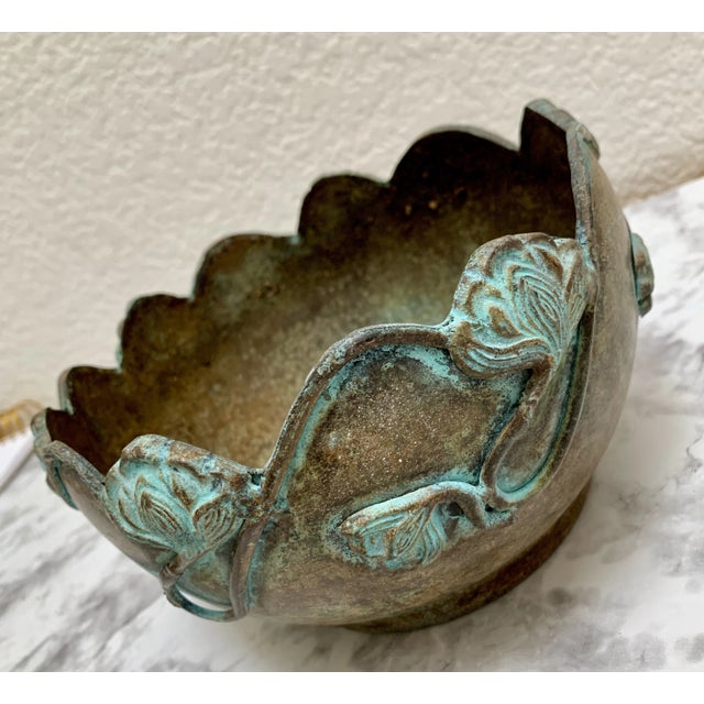 Vintage earthy rustic decor bowl or plant vessel. Oxidized aged brass with textured flowers and curvy edges. Perfect for...