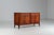 Striking Model 5 sideboard, designed by Gunni Omann and produced by Omann Jun in Denmark in the 1960s. It is a fine...